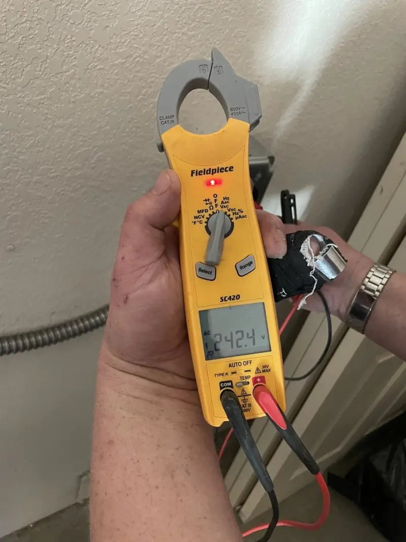Voltage testing with clamp meter during Generator Installation in Southampton
